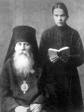 Священномученик Феофан (Ильменский), епископ Соликамский и послушник Иоанн Лихачев (справа). 1917–1918<br>Ист.: Игумен ...